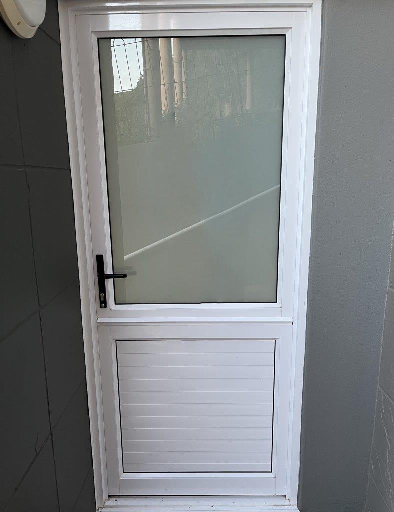 Stable door with glass and slats